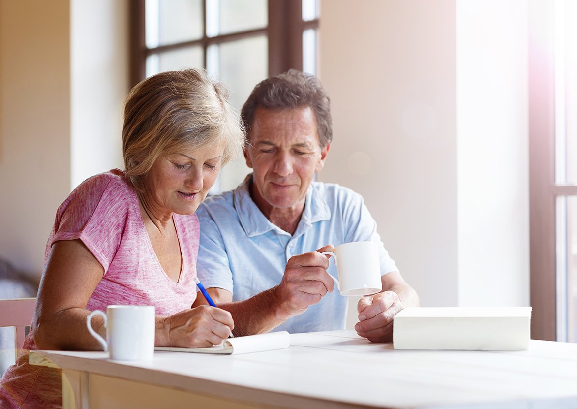 Older couple drinking a hot drink